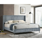 Cama tapizada con paneles de pana ancha Mavela con 2 mesitas de noche y banco, azul